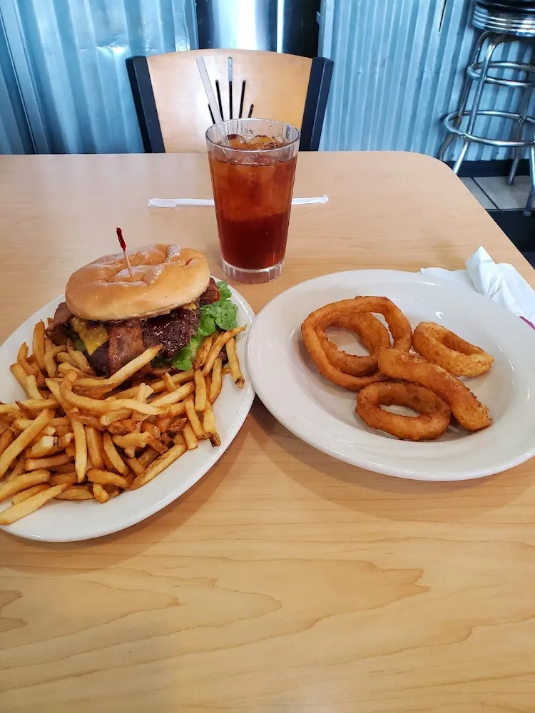 BBQ Bacon Cheddar Burger with Fries and Onion Rings
